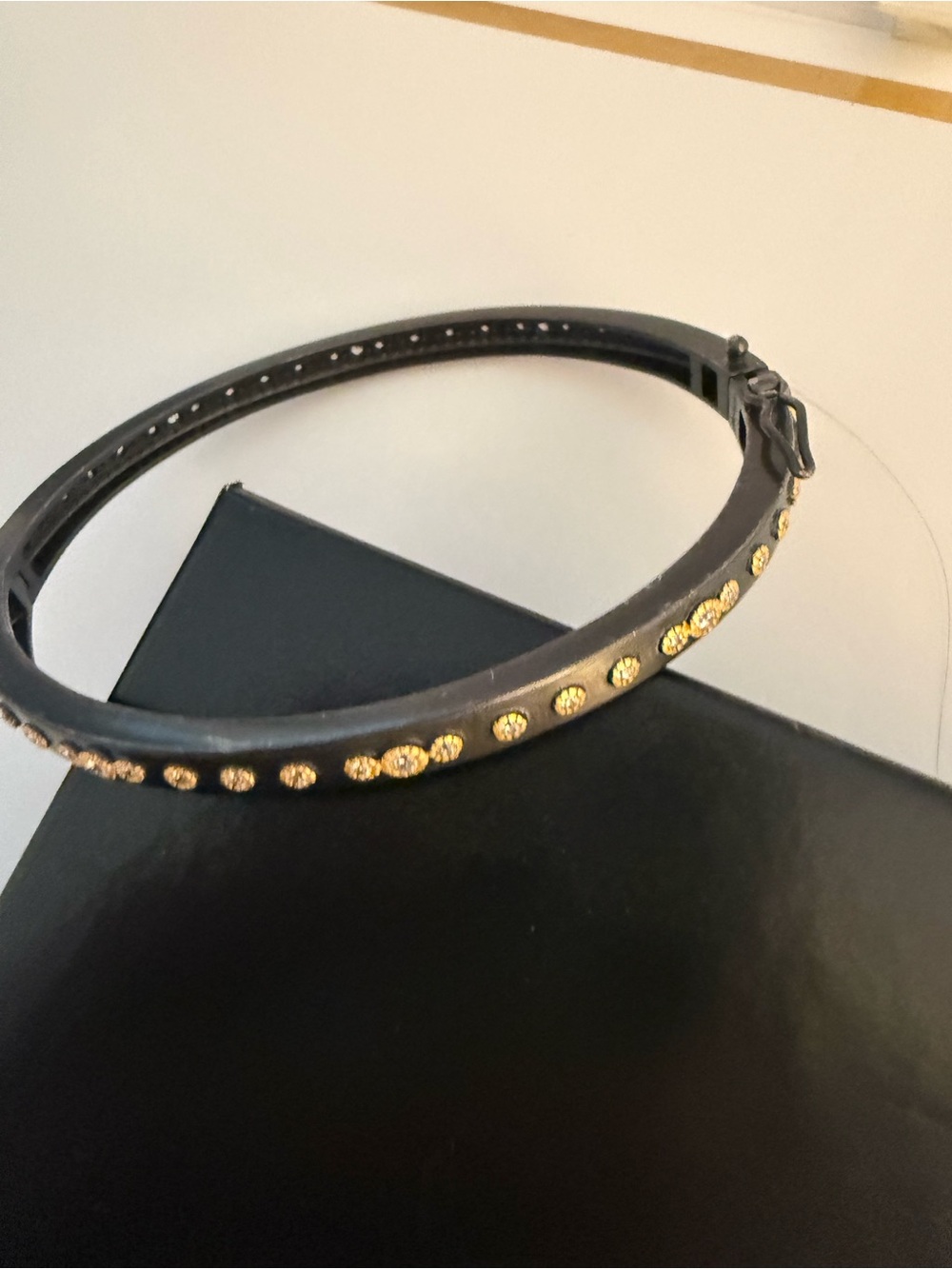 Freida Rothman hinged studded bracelet.